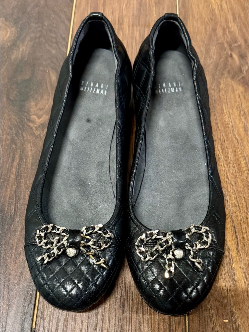 Stuart Weitzman Black Quilted Leather Ballet Flats with Chain-Bow